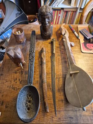 a wooden table topped with various items on it