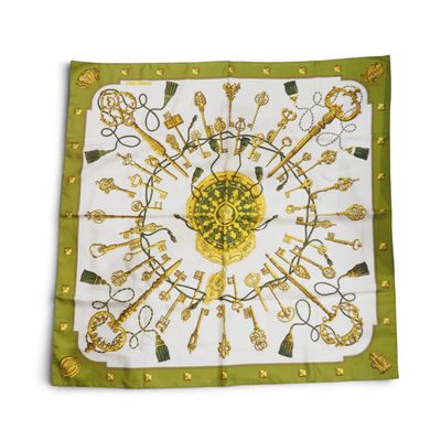 a picture of a square scarf with a bunch of keys on it