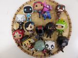 a basket with a bunch of toy figures on it