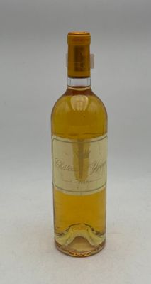bottle of white wine sitting on a white surface with a white background