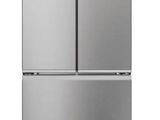 a silver refrigerator freezer sitting on top of a white background