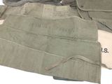 two aprons that are sitting on top of each other