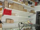 many boxes and boxes on the shelves in the room