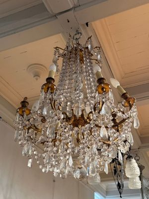 a chandelier hanging from the ceiling in a room