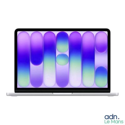 an apple macbook pro laptop with a purple and blue background