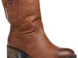 a close up of a pair of brown boots on a white background