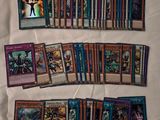 a close up of a bunch of cards on a bed