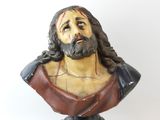 statue of jesus on a marble bust on a white background