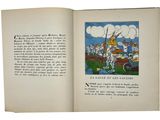 an open book with a picture of a man riding a horse