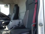 a view of the inside of a truck with the driver ' s seat up