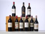 several bottles of wine are lined up in a row on a table