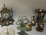 a lot of antique items that are on the table