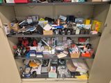 many items on the shelves in the closet