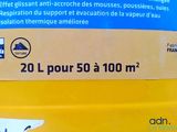 a yellow container with a label on it sitting on a table