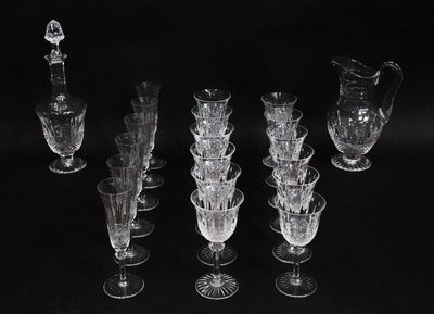 a lot of glass vases that are sitting on a table