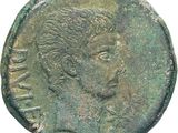 an ancient roman coin with a woman ' s face on it
