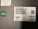 a sticker on the back of a laptop with a barcode on it