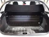 a trunk of a car with the back seats folded down