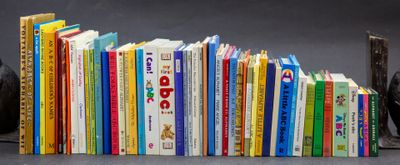 a lot of books that are sitting on a table