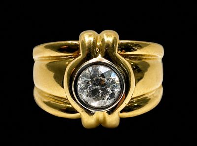 an image of a gold ring with a diamond in the center