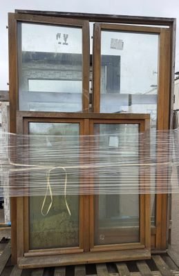 a large window that has been wrapped up on a pallet