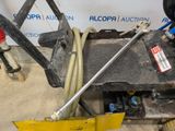 a close up of a machine with a hose attached to it