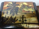 a picture of a painting on a wooden table