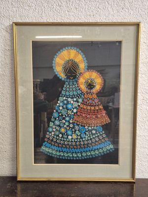 a picture of a framed picture of a mother and child