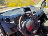 a car dashboard with a steering wheel and a dash board