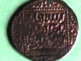 an old coin with a picture of a man on it