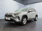 a grey toyota rav parked in a garage