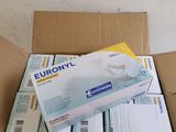 a cardboard box with a bunch of medical supplies inside of it
