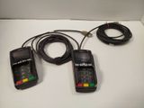 two cell phones that are connected to a cord