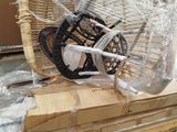 a bike that is wrapped in plastic and sitting on a pallet