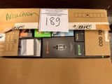 a cardboard box with a lot of electronic items inside of it