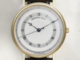 an image of a close up of a wrist watch with roman numerals