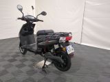 a scooter that is parked in a room