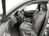 the interior of a car with the door open showing the driver ' s seat