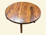 a wooden table with a wooden top on a white background