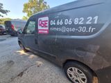 an image of a van that is parked in a parking lot