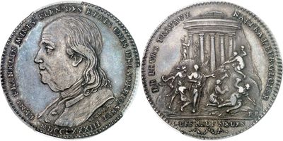 an image of a silver coin with a picture of a man on a horse