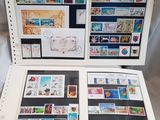 a lot of stamps on the pages of a book