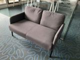 a couch that is sitting in the middle of a room