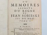 an open book with a black and white title on it