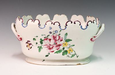 a white bowl with a floral design on it