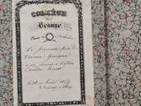 an old document on the wall with a picture of a man