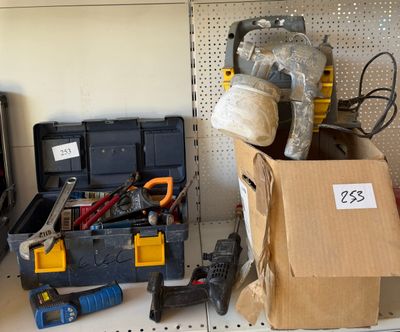 many tools on the shelf in the garage