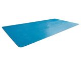 un gros plan d'un tapis bleu sur fond blanc
