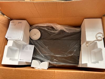 a cardboard box with a bunch of items inside of it