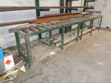 a long table that has a bunch of wooden planks on it